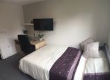Student Accommodation Loughborough - Desk area with TV and double bed