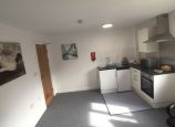 Student Accommodation Loughborough - En-suite room with sink, fridge, cooker